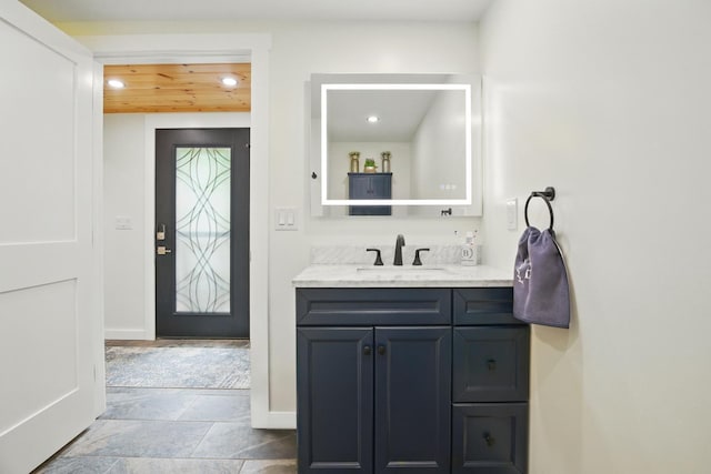 7 Scenic View Dr, Naples, ME 04055 - bathroom featuring recessed lighting, vanity, wooden ceiling, and baseboards
