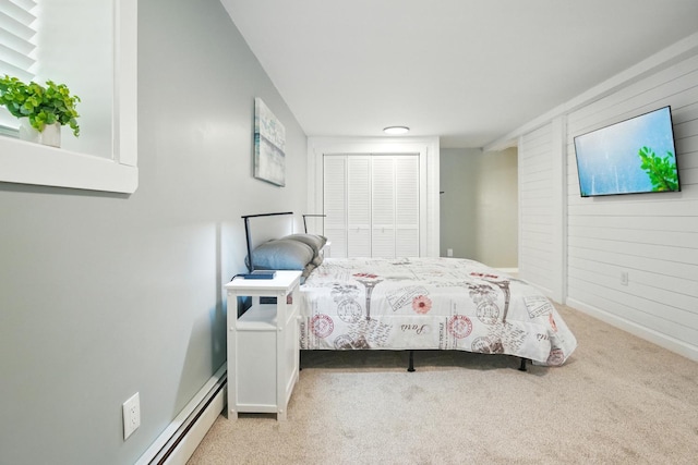 7 Scenic View Dr, Naples, ME 04055 - bedroom with carpet floors, wooden walls, baseboard heating, and baseboards