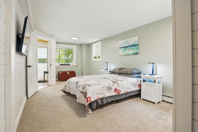 7 Scenic View Dr, Naples, ME 04055 - bedroom featuring baseboard heating, light colored carpet, and baseboards