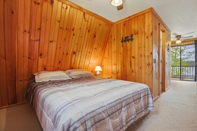 7 Scenic View Dr, Naples, ME 04055 - bedroom featuring carpet, access to outside, wooden walls, and a ceiling fan