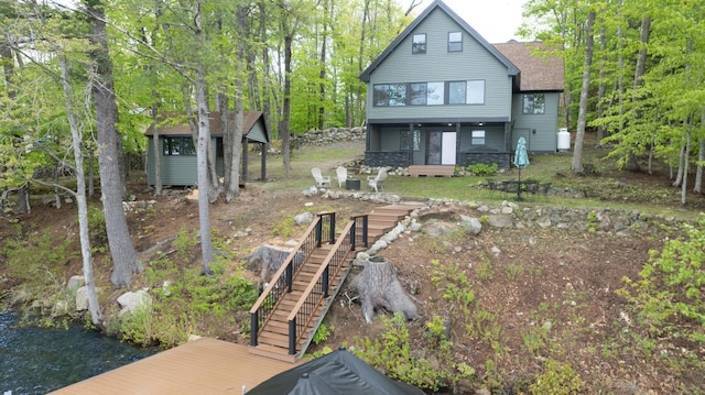 7 Scenic View Dr, Naples, ME 04055 - rear view of house featuring stairs and a sunroom
