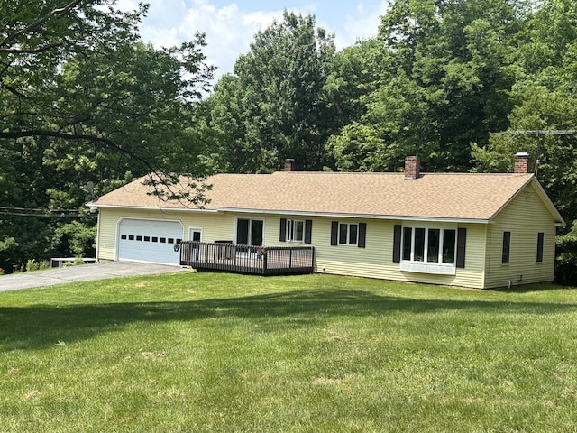 270 Mccrillis Corner Rd, Wilton, ME 04294 - single story home featuring a chimney, an attached garage, driveway, a front yard, and a wooden deck