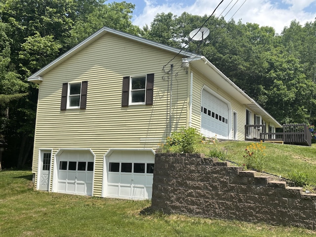 270 Mccrillis Corner Rd, Wilton, ME 04294 - view of property exterior with a lawn and an attached garage