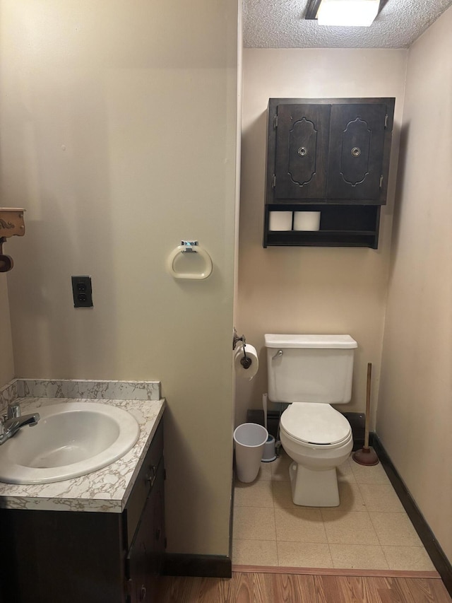 270 Mccrillis Corner Rd, Wilton, ME 04294 - half bath featuring vanity and a textured ceiling