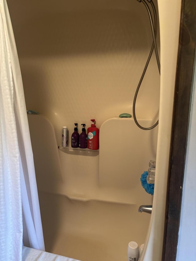 270 Mccrillis Corner Rd, Wilton, ME 04294 - bathroom view of a shower with shower curtain and a tub