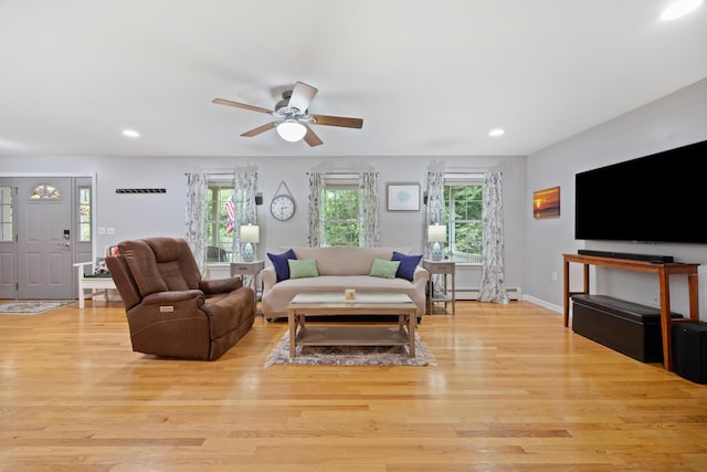 30 Maxfield Dr, Orono, ME 04473 - living room with ceiling fan, a baseboard radiator, light wood-style floors, recessed lighting, and baseboards