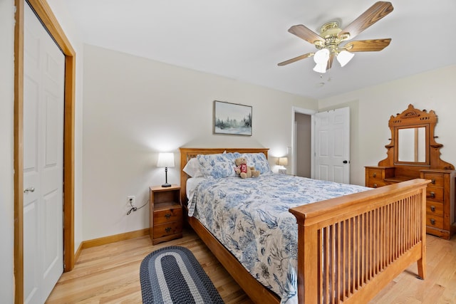 30 Maxfield Dr, Orono, ME 04473 - bedroom with light wood-style flooring, baseboards, and a ceiling fan
