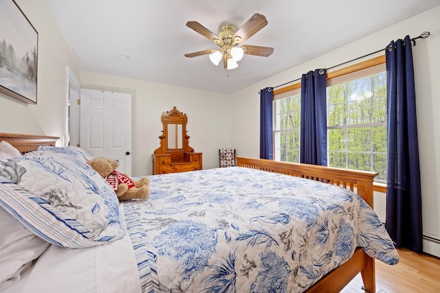 30 Maxfield Dr, Orono, ME 04473 - bedroom featuring light wood-type flooring and a ceiling fan