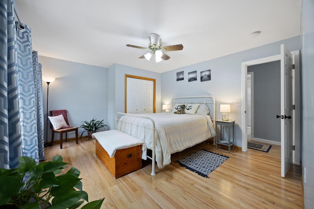 30 Maxfield Dr, Orono, ME 04473 - bedroom with light wood-type flooring, ceiling fan, a closet, and baseboards