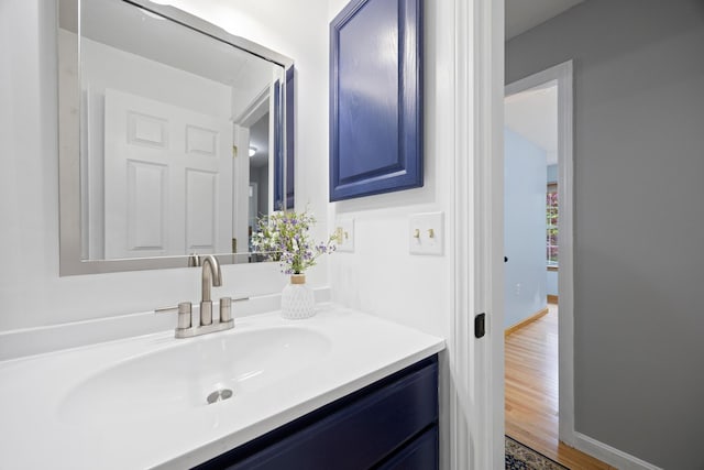 30 Maxfield Dr, Orono, ME 04473 - bathroom featuring vanity and wood finished floors