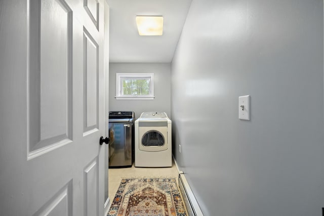 30 Maxfield Dr, Orono, ME 04473 - laundry area with separate washer and dryer, a baseboard heating unit, and light tile patterned flooring