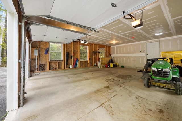 30 Maxfield Dr, Orono, ME 04473 - garage featuring a garage door opener