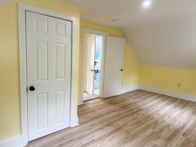 70 Pearl St, Bangor, ME 04401 - bonus room with baseboards, light wood-type flooring, and lofted ceiling