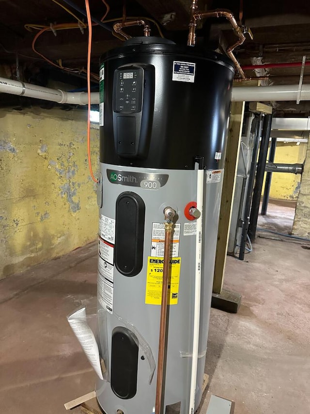 70 Pearl St, Bangor, ME 04401 - utility room featuring heat pump water heater