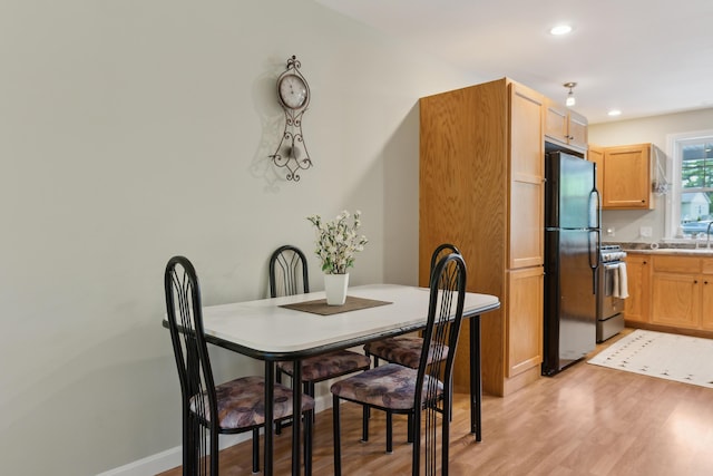 32 Edgefield Ln Unit 5, Brunswick, ME 04011 - dining area with light wood-style floors, recessed lighting, and baseboards