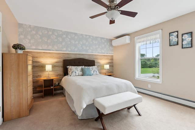 32 Edgefield Ln Unit 5, Brunswick, ME 04011 - carpeted bedroom featuring wallpapered walls, an AC wall unit, an accent wall, a ceiling fan, and a baseboard radiator