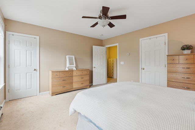 32 Edgefield Ln Unit 5, Brunswick, ME 04011 - bedroom with light carpet, a ceiling fan, baseboards, and a baseboard heating unit
