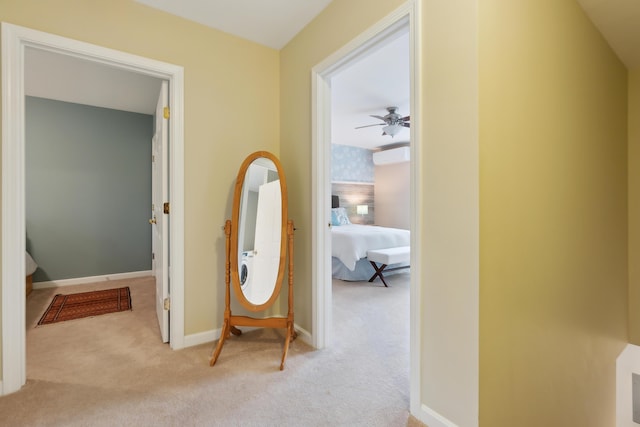 32 Edgefield Ln Unit 5, Brunswick, ME 04011 - corridor featuring light carpet, an AC wall unit, and baseboards