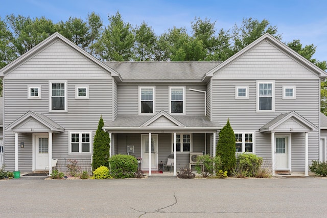 32 Edgefield Ln Unit 5, Brunswick, ME 04011 - view of front of house featuring covered porch and a shingled roof