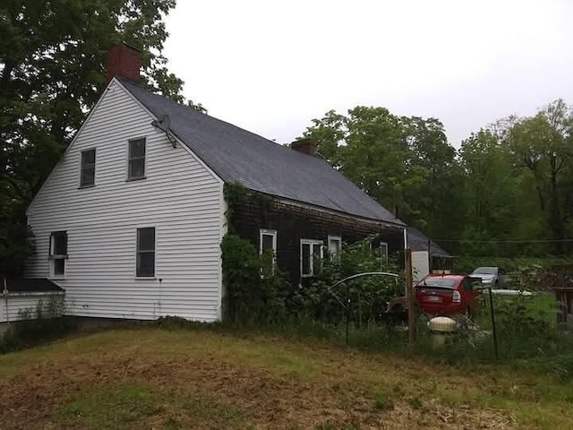 284 Old Brunswick Rd, Gardiner, ME 04345 - view of side of property with a chimney