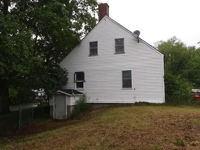 284 Old Brunswick Rd, Gardiner, ME 04345 - view of property exterior featuring a chimney