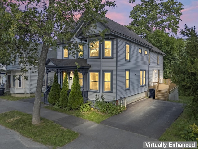 130 W Broadway, Bangor, ME 04401 - view of front of home with asphalt driveway and a shingled roof