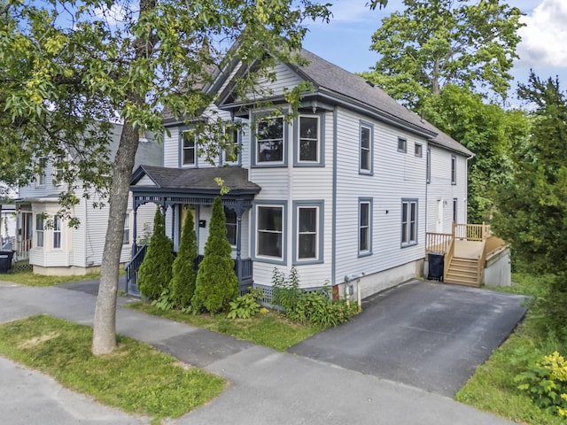 130 W Broadway, Bangor, ME 04401 - view of front of home featuring roof with shingles and asphalt driveway