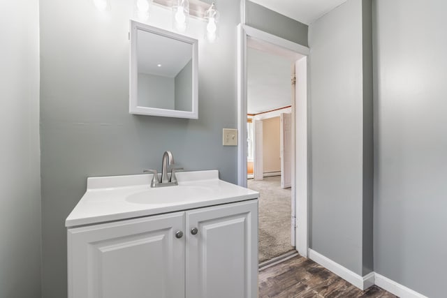 130 W Broadway, Bangor, ME 04401 - bathroom with wood finished floors and vanity