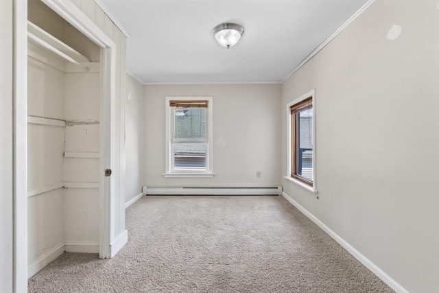 130 W Broadway, Bangor, ME 04401 - unfurnished bedroom featuring a baseboard radiator, carpet flooring, multiple windows, and ornamental molding