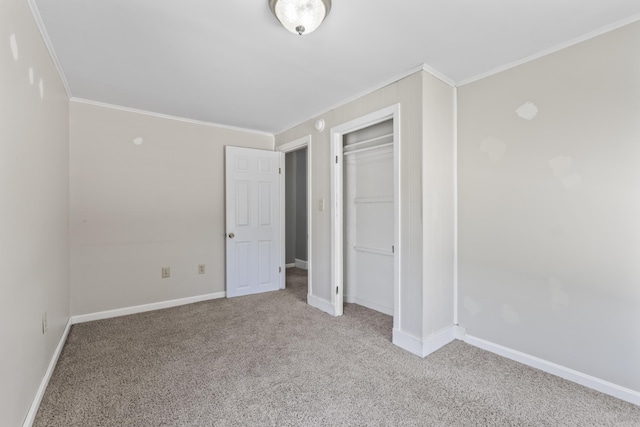 130 W Broadway, Bangor, ME 04401 - unfurnished bedroom featuring ornamental molding, carpet flooring, and a closet
