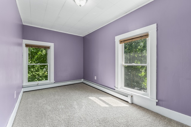 130 W Broadway, Bangor, ME 04401 - unfurnished room with healthy amount of natural light, carpet, a baseboard heating unit, and crown molding