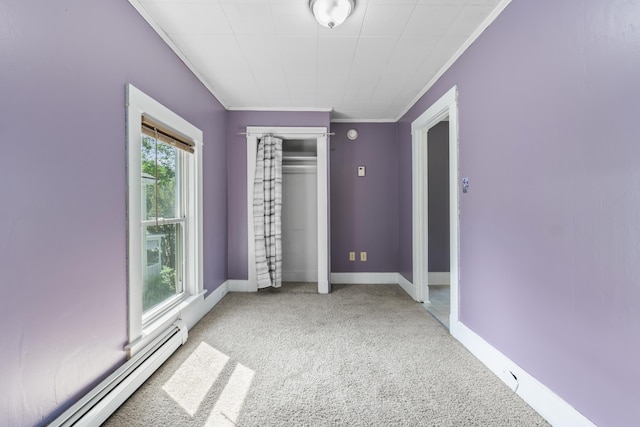 130 W Broadway, Bangor, ME 04401 - unfurnished bedroom featuring a baseboard heating unit, carpet flooring, ornamental molding, and a closet