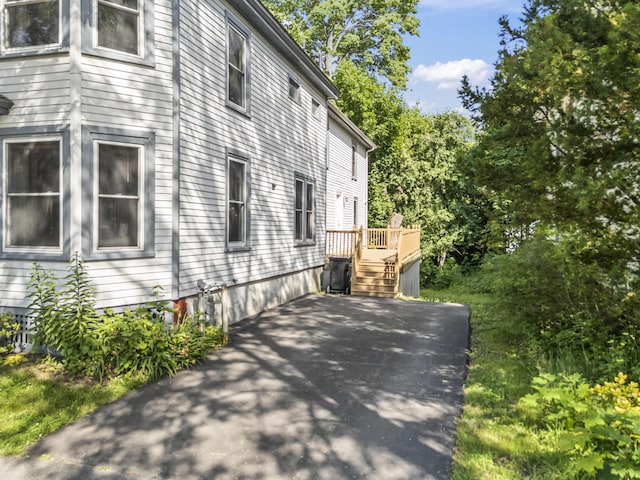 130 W Broadway, Bangor, ME 04401 - view of side of property featuring a wooden deck