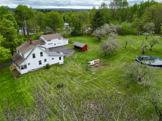 90 W Main St, Milo, ME 04463 - aerial view of property and surrounding area featuring a forest