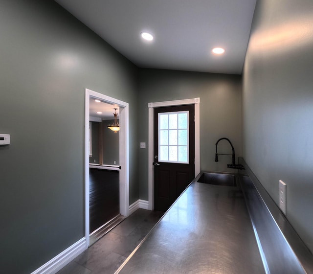 90 W Main St, Milo, ME 04463 - entryway featuring a sink, recessed lighting, and baseboards