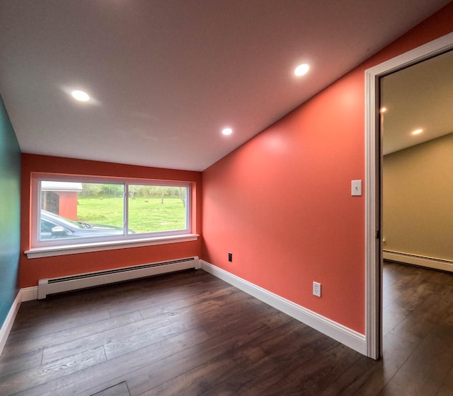 90 W Main St, Milo, ME 04463 - unfurnished room featuring baseboard heating, dark wood finished floors, baseboards, and recessed lighting