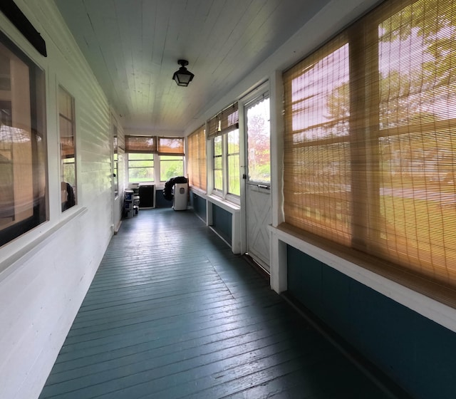 90 W Main St, Milo, ME 04463 - unfurnished sunroom with hardwood / wood-style flooring and wood ceiling