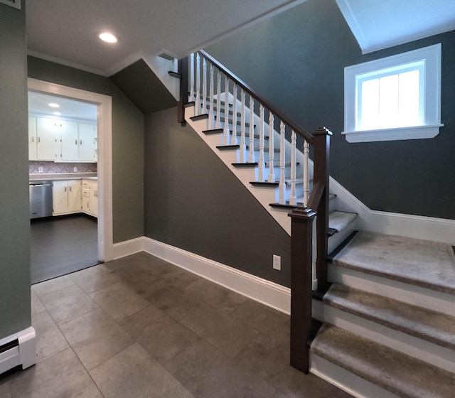 90 W Main St, Milo, ME 04463 - stairs featuring a baseboard heating unit, baseboards, and recessed lighting