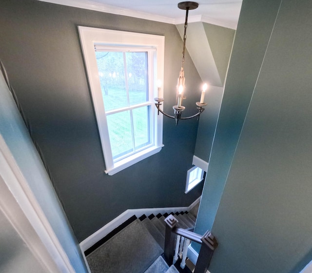 90 W Main St, Milo, ME 04463 - detailed view of a chandelier, ornamental molding, and baseboards