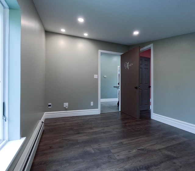 90 W Main St, Milo, ME 04463 - spare room with recessed lighting, baseboards, dark wood-style flooring, and a baseboard radiator