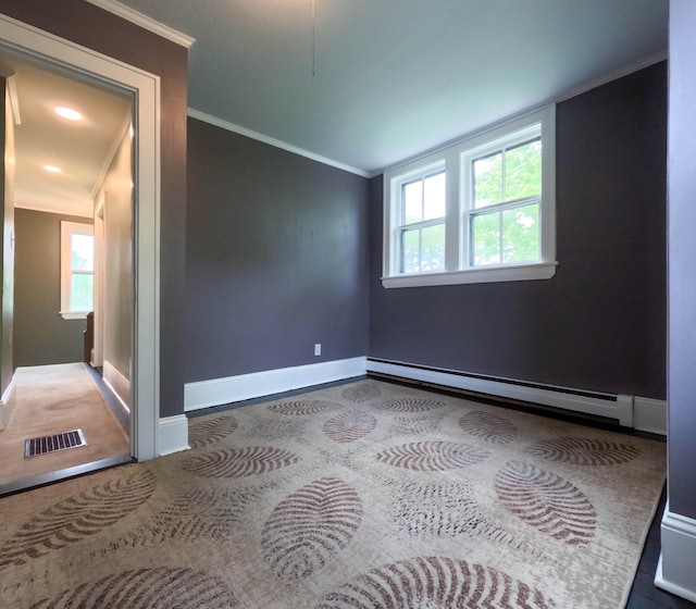 90 W Main St, Milo, ME 04463 - unfurnished room featuring a baseboard heating unit, plenty of natural light, crown molding, baseboards, and lofted ceiling
