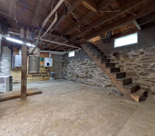 90 W Main St, Milo, ME 04463 - below grade area featuring stairs and heating unit