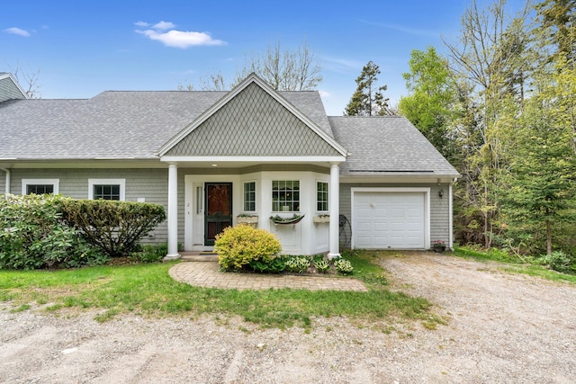 2 Round Cove Ln Unit 2, Phippsburg, ME 04562 - view of front of property featuring a shingled roof, an attached garage, and driveway
