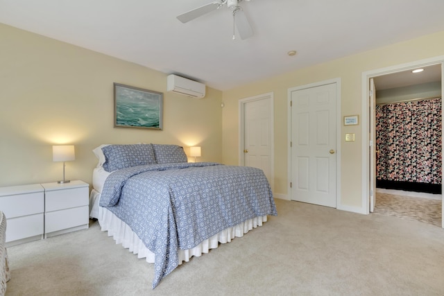 2 Round Cove Ln Unit 2, Phippsburg, ME 04562 - bedroom featuring light carpet, a wall mounted air conditioner, ceiling fan, and baseboards