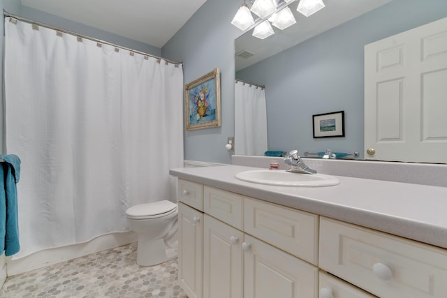 2 Round Cove Ln Unit 2, Phippsburg, ME 04562 - full bath with toilet, vanity, a shower with shower curtain, and tile patterned floors