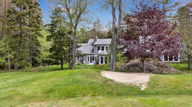 2 Round Cove Ln Unit 2, Phippsburg, ME 04562 - view of front facade with a front yard and a chimney