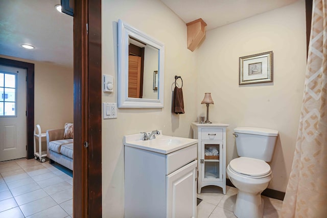 17 Bank Rd, York, ME 03909 - full bathroom with tile patterned floors, vanity, toilet, ensuite bath, and baseboards