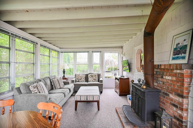 17 Bank Rd, York, ME 03909 - sunroom / solarium featuring a wood stove, beam ceiling, and carpet floors