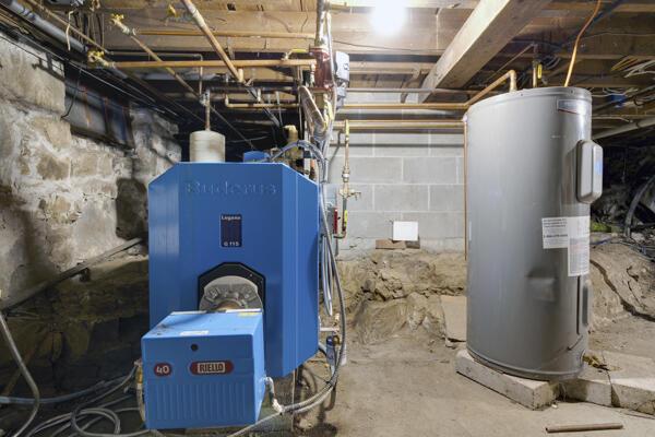 17 Bank Rd, York, ME 03909 - utility room featuring electric water heater
