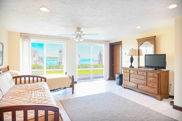 17 Bank Rd, York, ME 03909 - bedroom with access to exterior, light tile patterned floors, recessed lighting, a textured ceiling, and a ceiling fan